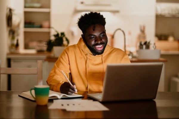 An,African,American,Man,Writes,Down,In,A,Textbook,While Lead Generation Foundations